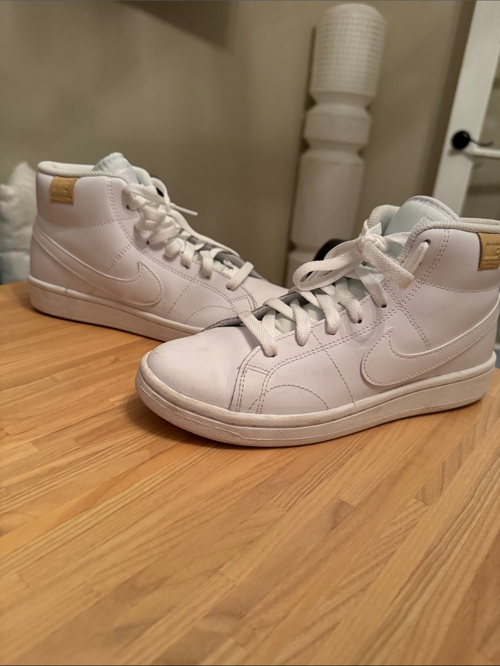 Nike White High-Top Leather Sneakers with Subtle Gold Tab